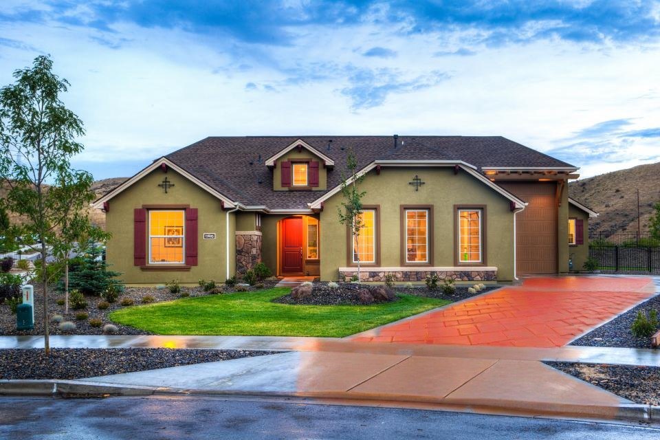 A driveway rendered in red block paving